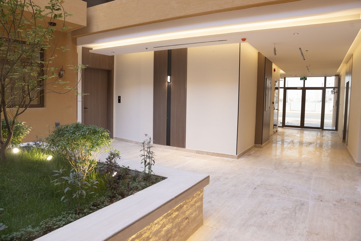 Circulation corridor opening to the courtyard