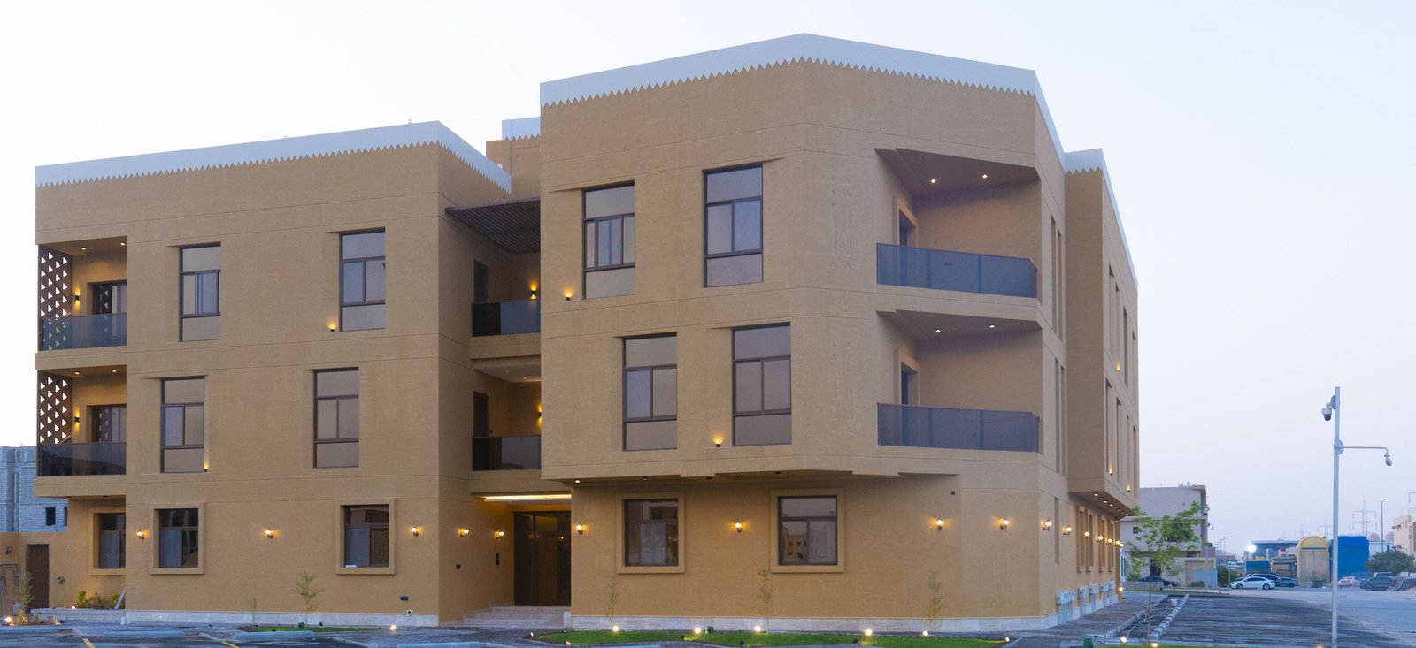 Dhahra Residence, completed, seen from the street at dusk